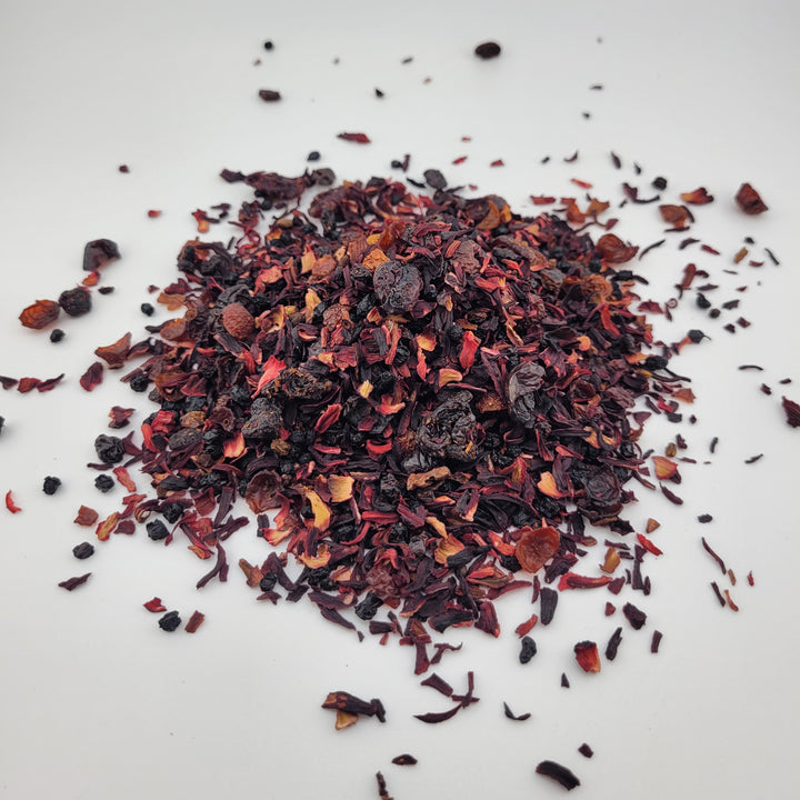 Crimson Zing Dried hibiscus flowers on a white background