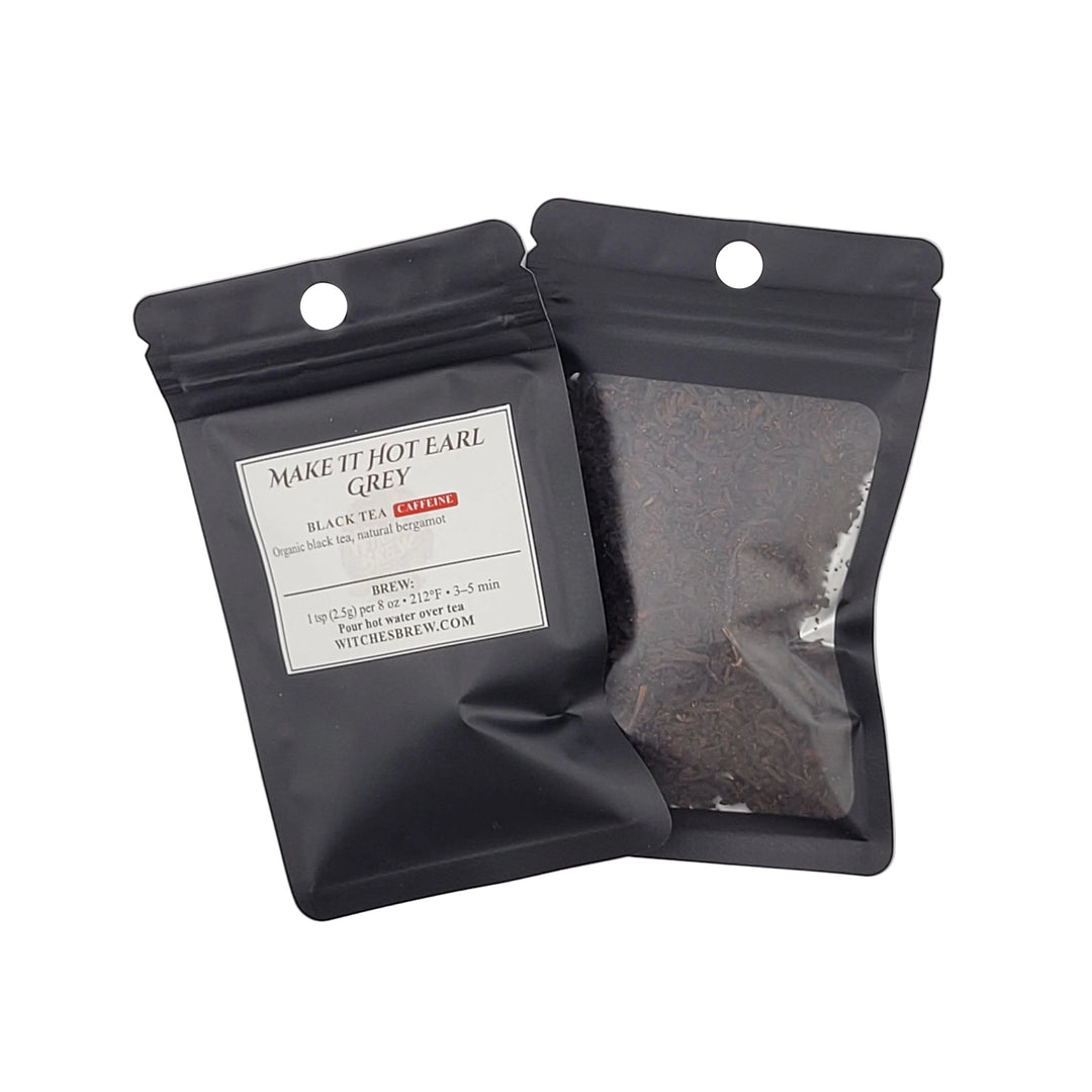 Two black tea packages on a white background