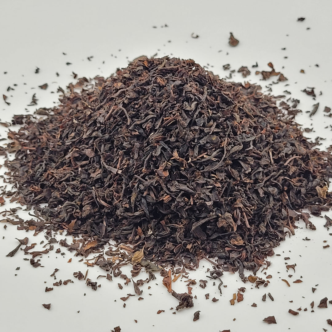 Dried black tea leaves on a light gray background Make it hot Earl gray tea