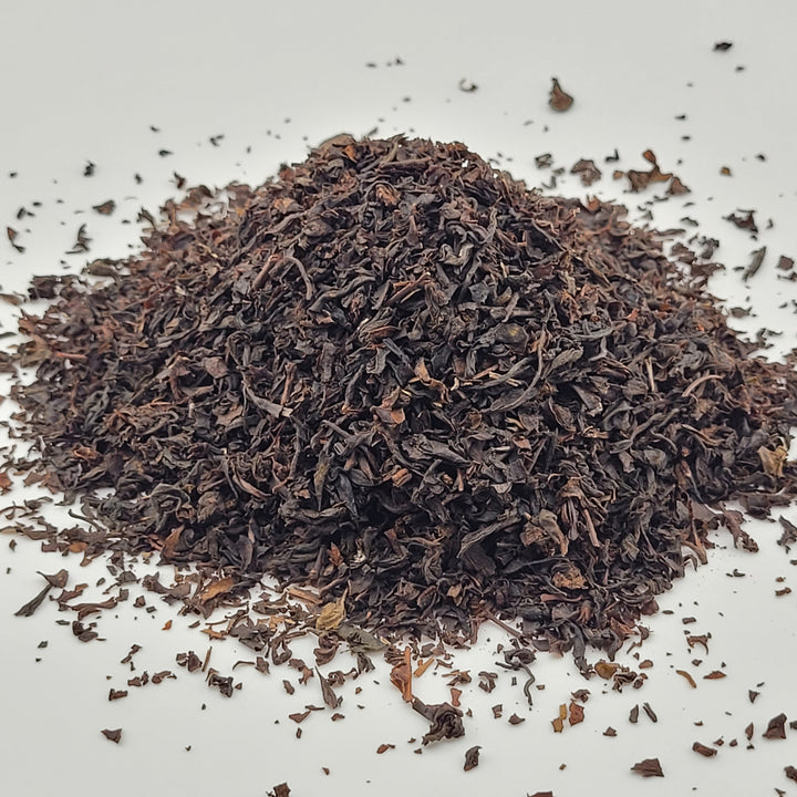 Dried black tea leaves on a light gray background Make it hot Earl gray tea