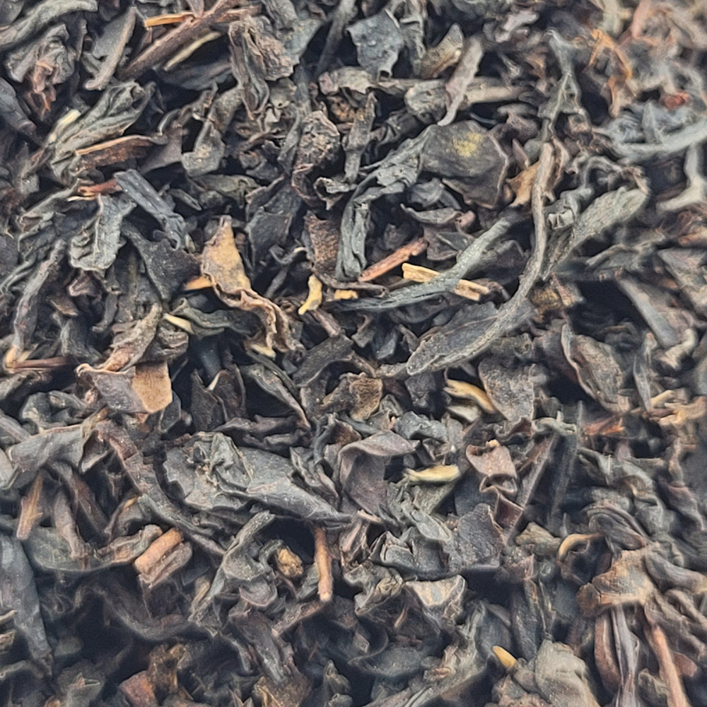 Close-up of dried black tea leaves Bake it Hot Earl gray