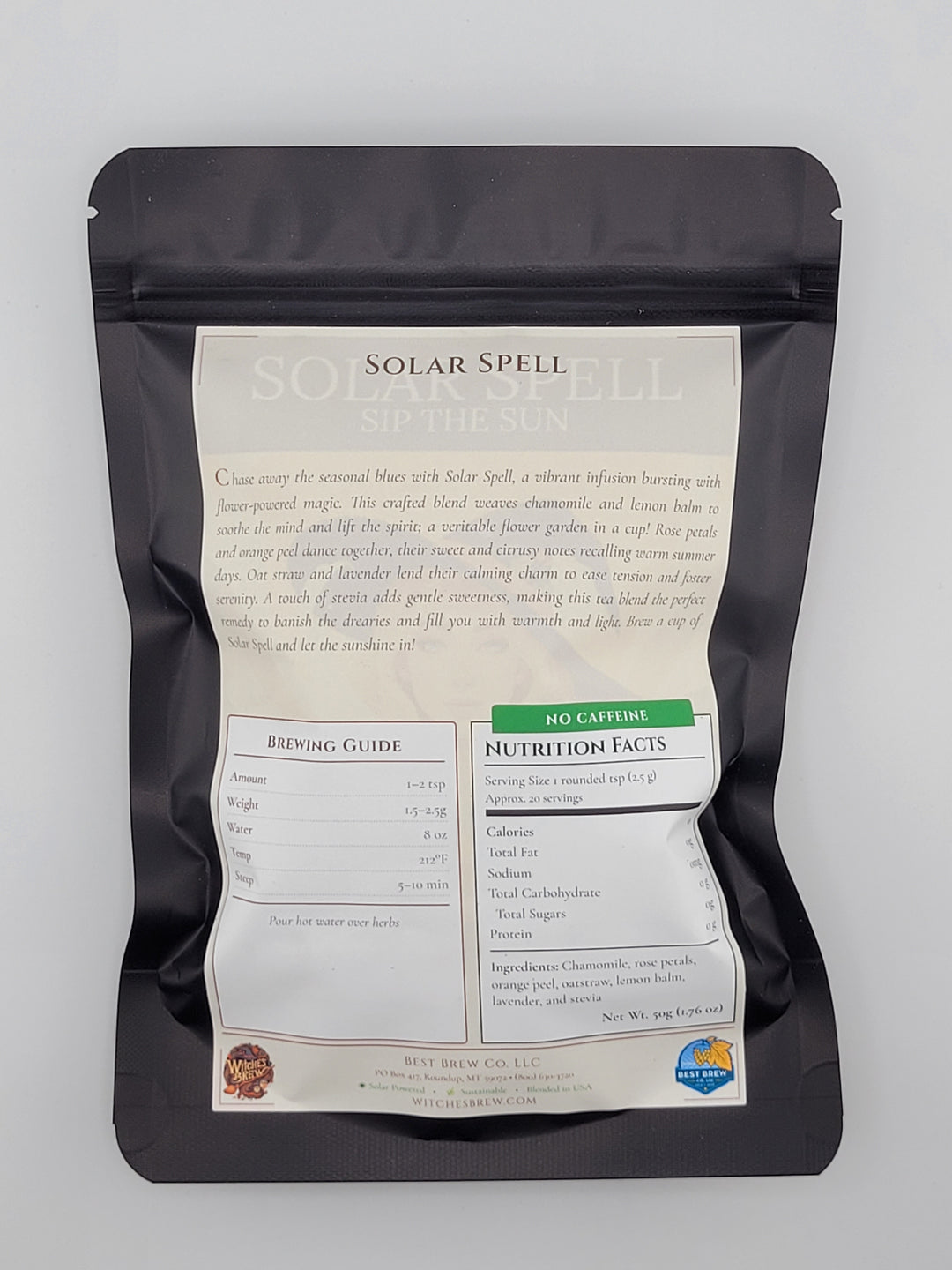 Black food packaging with a white label on a gray background