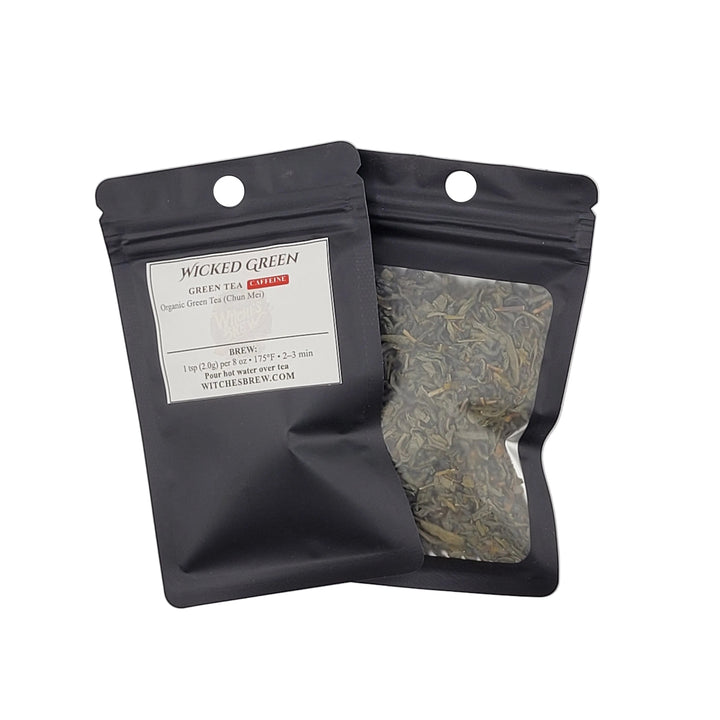 Wicked Green tea packaging with Wicked Green label on a gray background